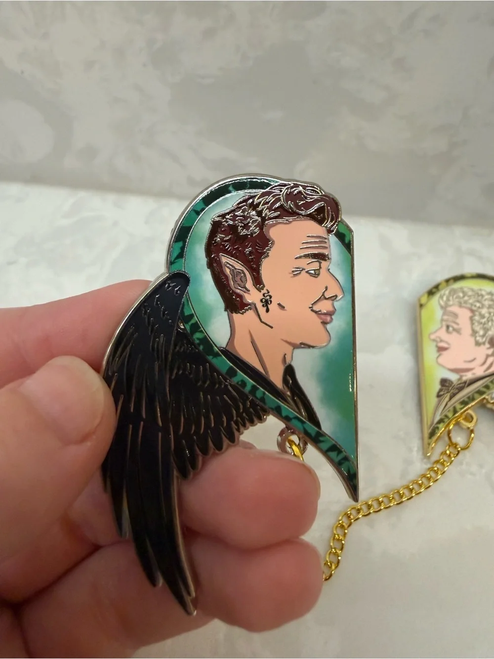 Good Omens Angel Wing Face Enamel Chain Pin - Black & White